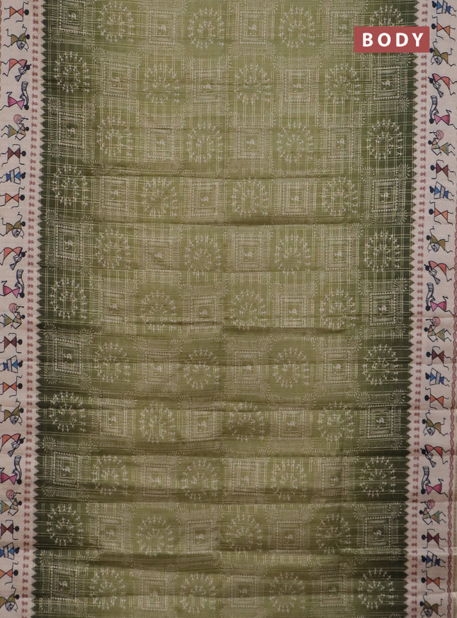 Semi tussar saree sap green and cream with allover zari checks & warli prints  and printed border