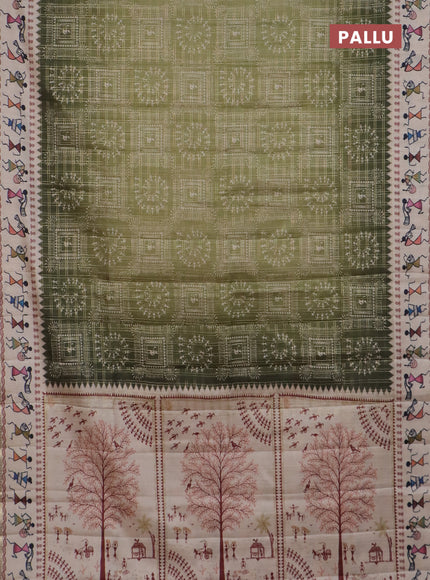 Semi tussar saree sap green and cream with allover zari checks & warli prints  and printed border