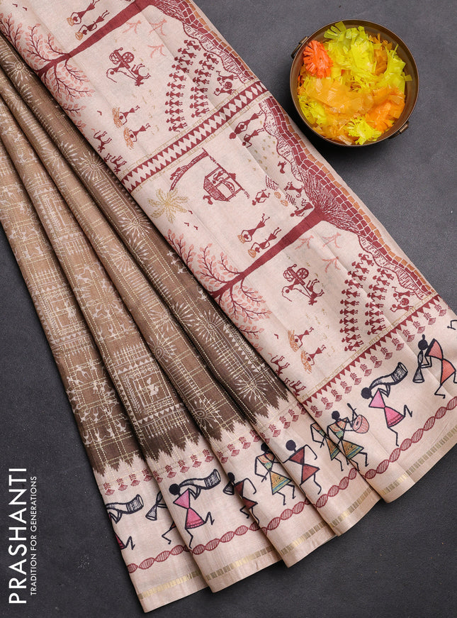 Semi tussar saree brown and cream with allover zari checks & warli prints  and printed border