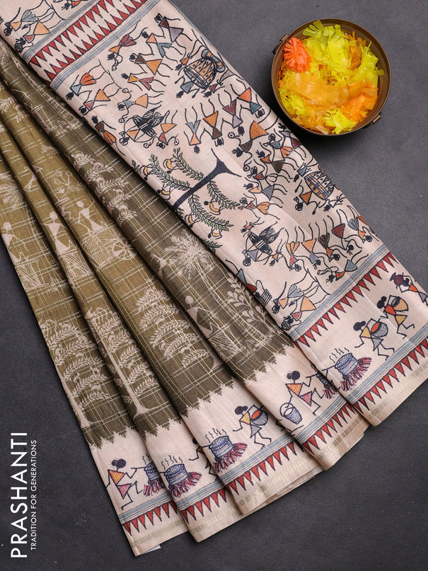 Semi tussar saree sap green and cream with allover zari checks & warli prints  and printed border