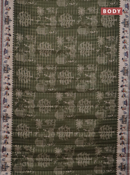 Semi tussar saree sap green and cream with allover zari checks & warli prints  and printed border