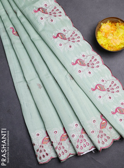 Semi raw silk saree pastel green with embroidery buttas and peacock embroidery cut work border