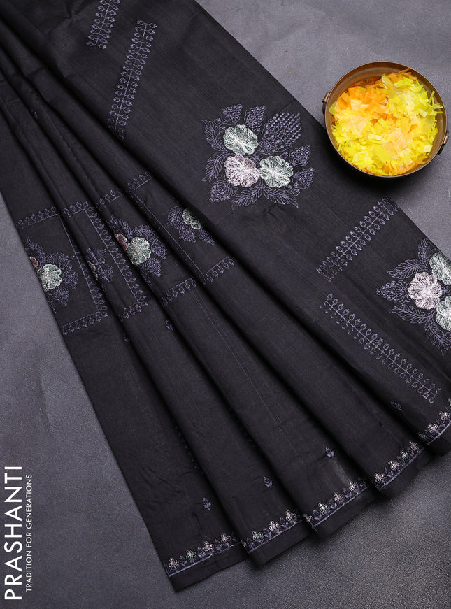 Semi raw silk saree black with allover embroidery buttas and embroidery border
