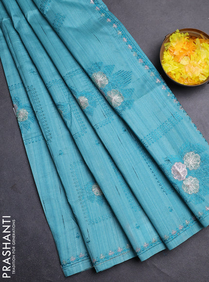 Semi raw silk saree teal blue with allover embroidery buttas and embroidery border