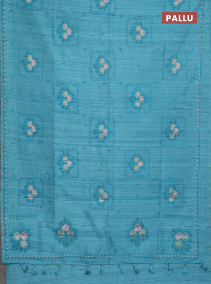 Semi raw silk saree teal blue with allover embroidery buttas and embroidery border