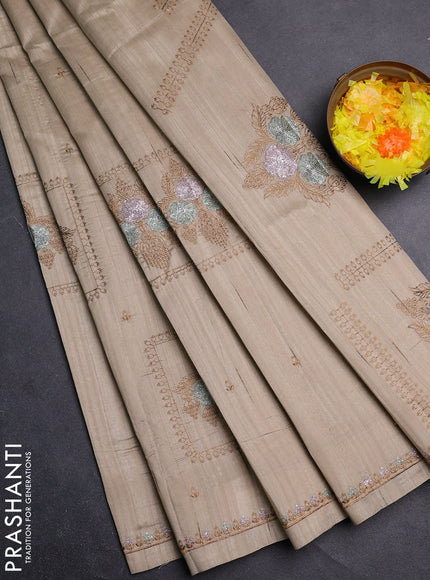 Semi raw silk saree beige with allover embroidery buttas and embroidery border