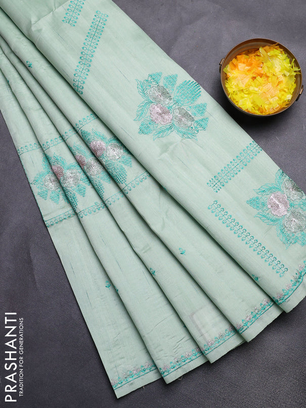 Semi raw silk saree pastel green with allover embroidery buttas and embroidery border