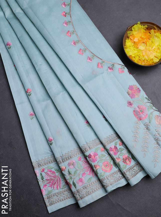 Semi raw silk saree pastel blue with embroidery buttas and floral embroidery border