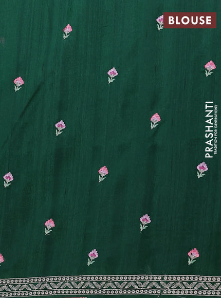 Semi raw silk saree green with embroidery buttas and floral embroidery border
