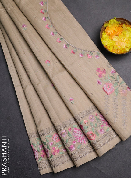 Semi raw silk saree beige with embroidery buttas and floral embroidery border