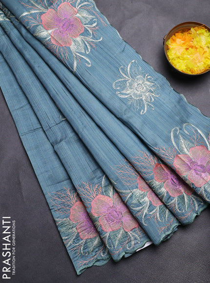 Semi raw silk saree pastel blue shade with plain body and floral embroidery border