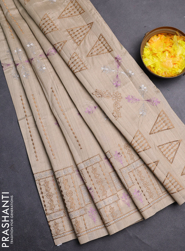 Semi raw silk saree beige with allover embroidery work and embroidery border