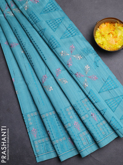 Semi raw silk saree teal blue with allover embroidery work and embroidery border