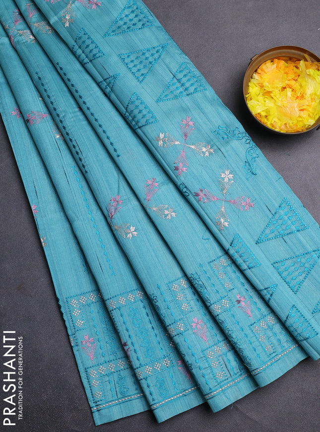 Semi raw silk saree teal blue with allover embroidery work and embroidery border