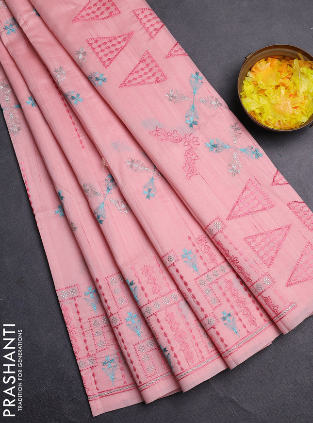 Semi raw silk saree mild peach with allover embroidery work and embroidery border