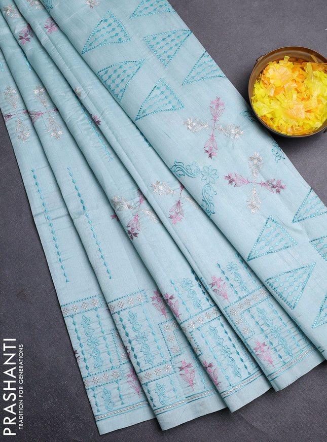 Semi raw silk saree pastel blue with allover embroidery work and embroidery border