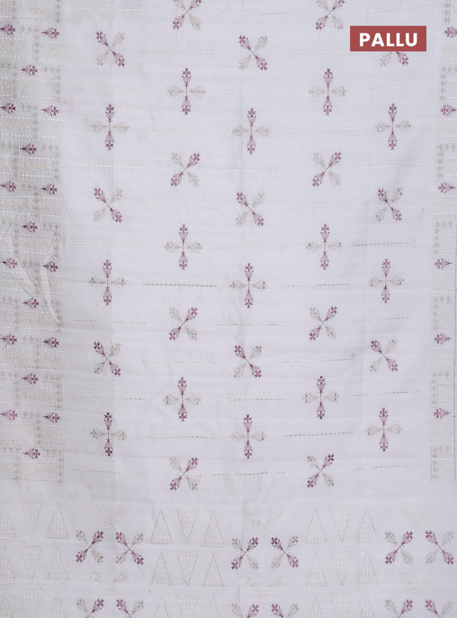 Semi raw silk saree off white with allover embroidery work and embroidery border