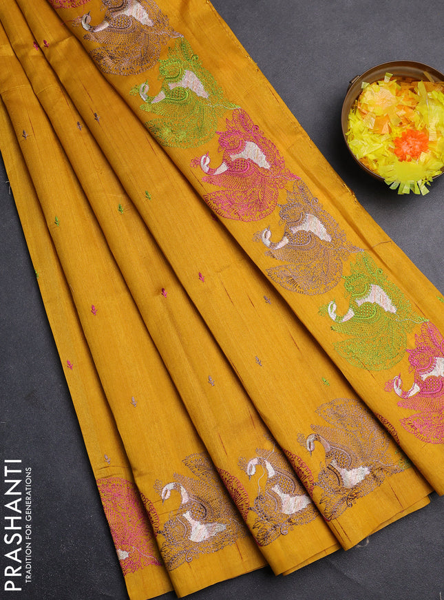Semi raw silk saree mustard yellow with allover embroidery work and peacock embroidery border