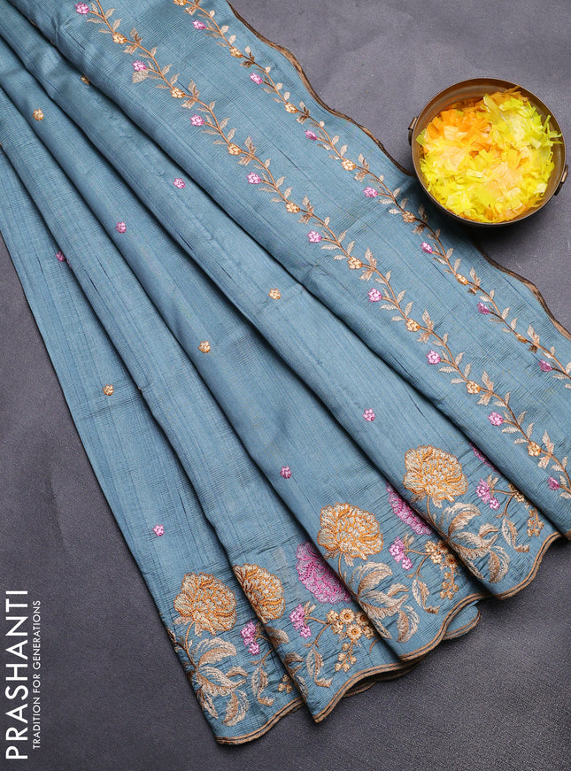 Semi raw silk saree pastel blue shade with embroidery buttas and floral embroidery border