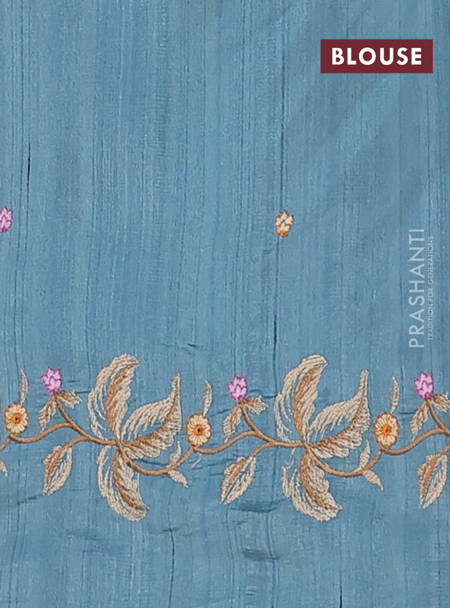 Semi raw silk saree pastel blue shade with embroidery buttas and floral embroidery border