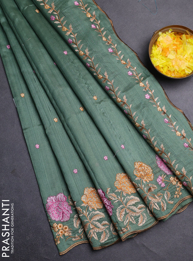 Semi raw silk saree green shade with embroidery buttas and floral embroidery border