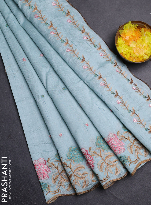 Semi raw silk saree pastel blue with embroidery buttas and floral embroidery border