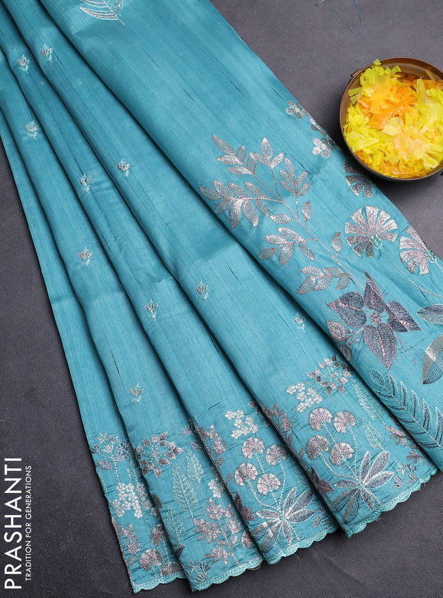 Semi raw silk saree teal blue with embroidery buttas and embroidery border
