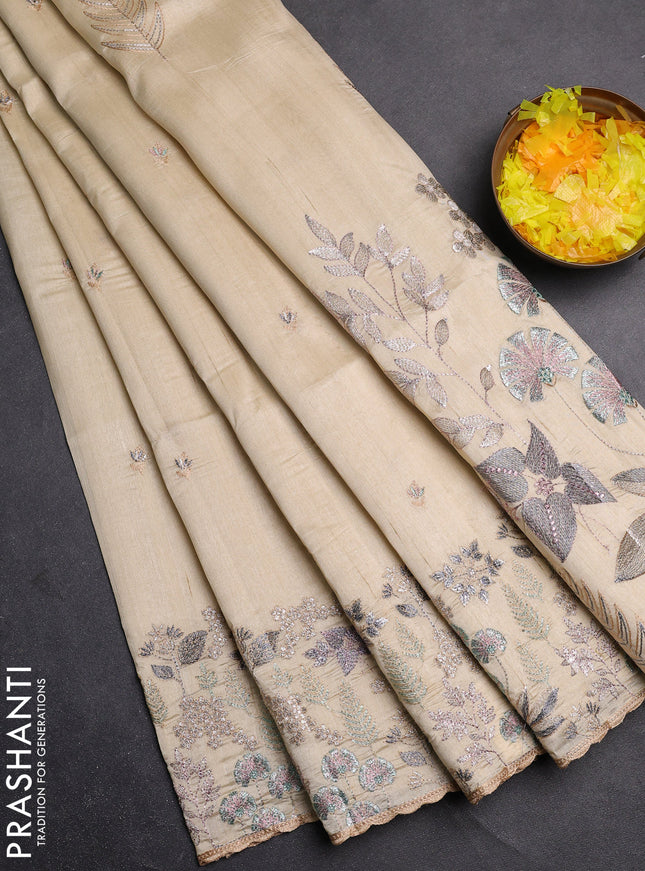 Semi raw silk saree cream with embroidery buttas and embroidery border
