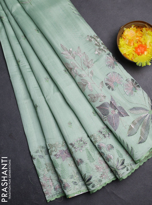 Semi raw silk saree pastel green with embroidery buttas and embroidery border