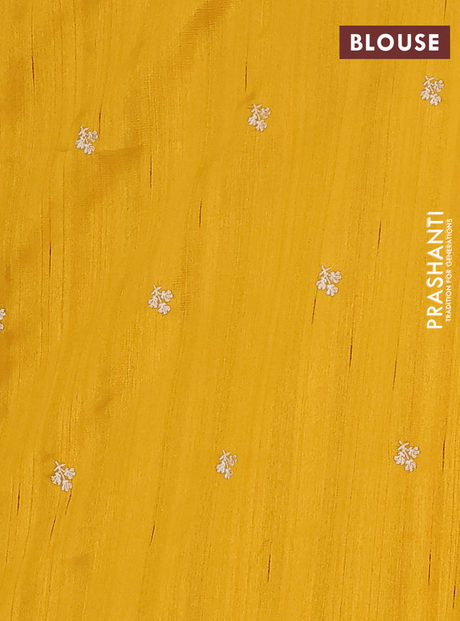 Semi raw silk saree mustard yellow with embroidery buttas and floral embroidery border