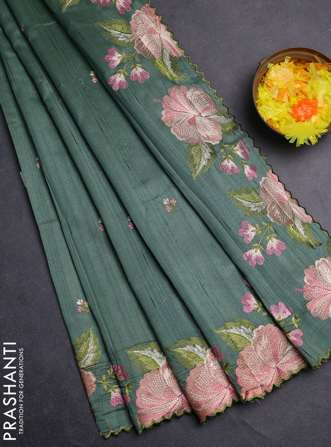 Semi raw silk saree green shade with embroidery buttas and floral embroidery border