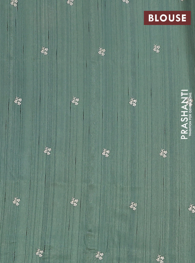 Semi raw silk saree green shade with embroidery buttas and floral embroidery border