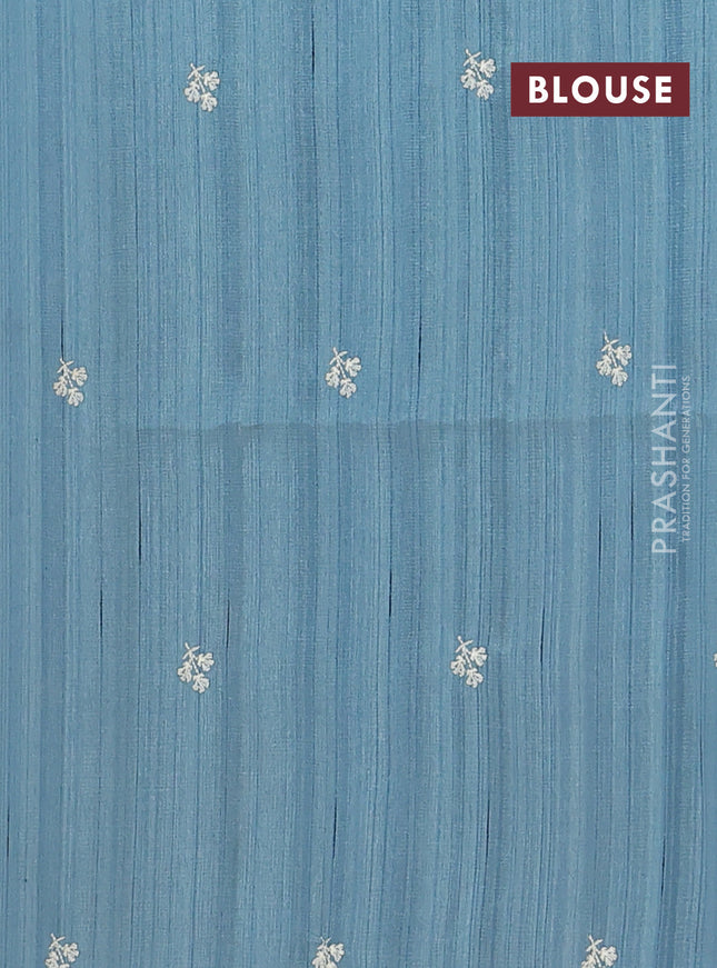 Semi raw silk saree pastel blue shade with embroidery buttas and floral embroidery border