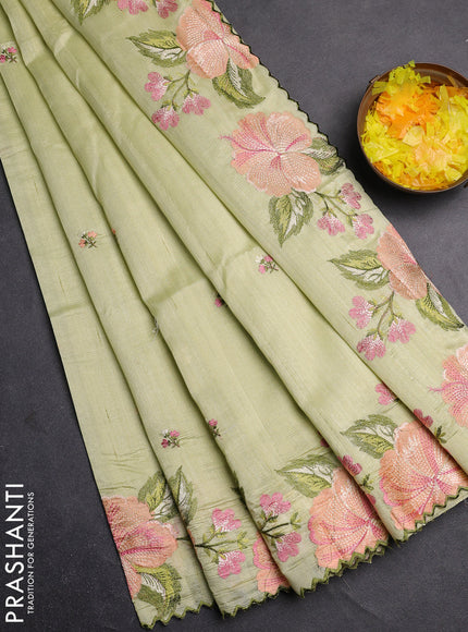 Semi raw silk saree pista green with embroidery buttas and floral embroidery border