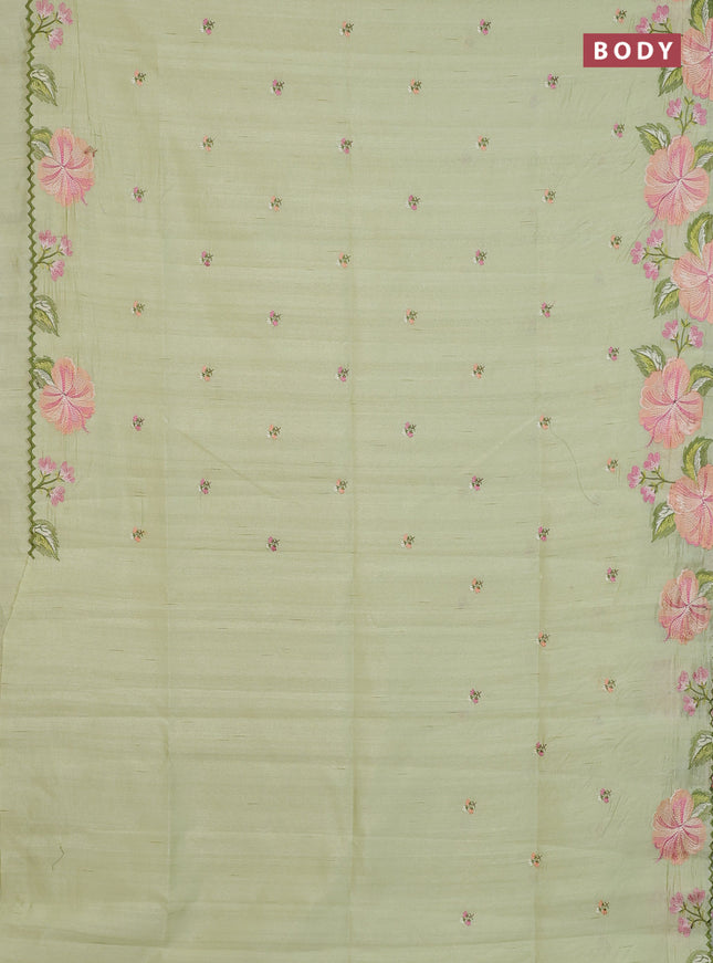 Semi raw silk saree pista green with embroidery buttas and floral embroidery border