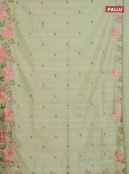 Semi raw silk saree pista green with embroidery buttas and floral embroidery border