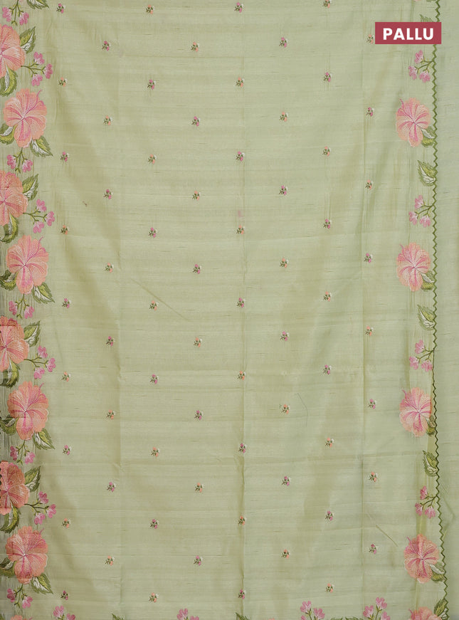 Semi raw silk saree pista green with embroidery buttas and floral embroidery border