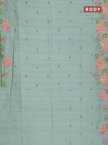 Semi raw silk saree pastel green with embroidery buttas and floral embroidery border