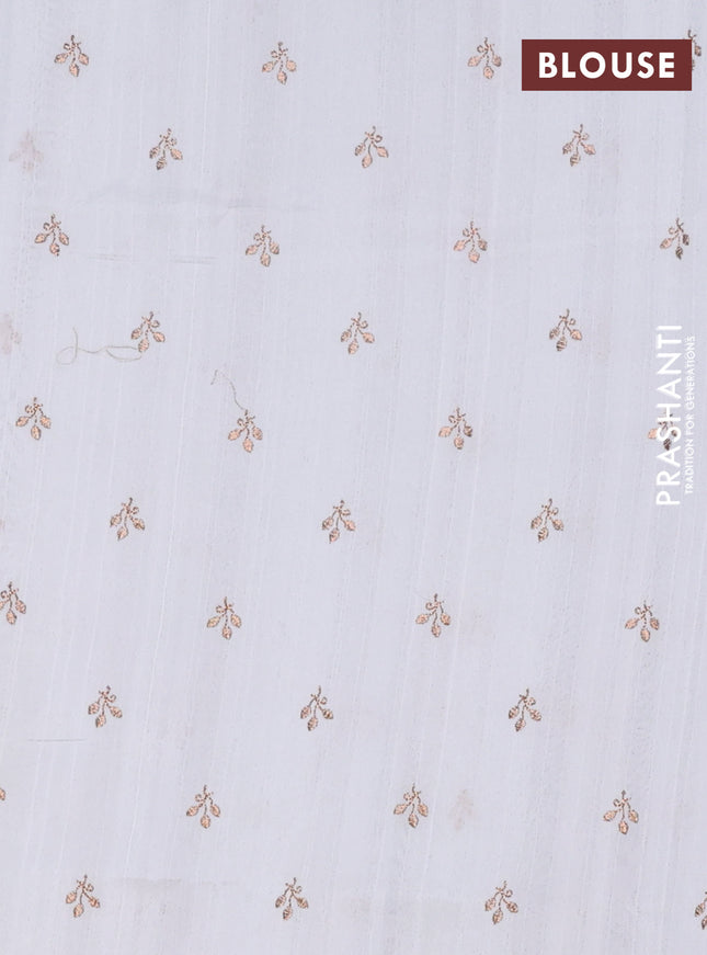 Semi raw silk saree off white with embroidery buttas in borderless style