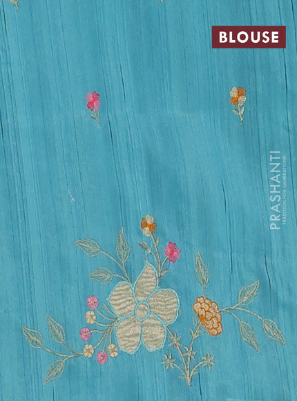 Semi raw silk saree teal blue with embroidery buttas and floral embroidery border