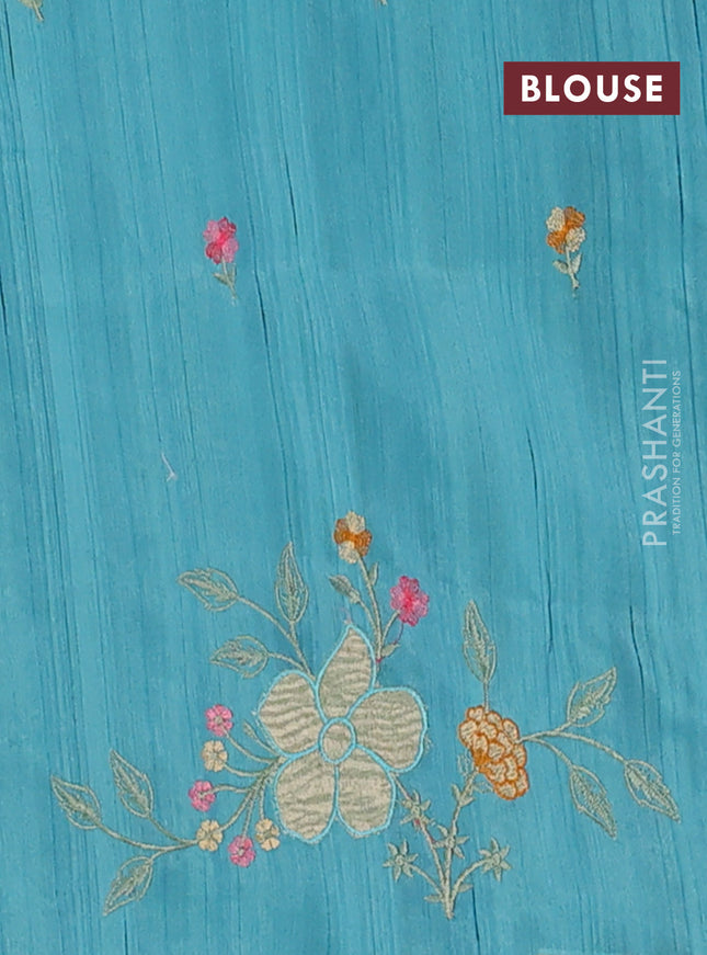 Semi raw silk saree teal blue with embroidery buttas and floral embroidery border