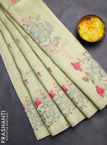 Semi raw silk saree pista green with embroidery buttas and floral embroidery border