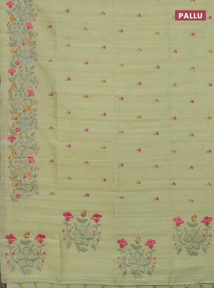 Semi raw silk saree pista green with embroidery buttas and floral embroidery border