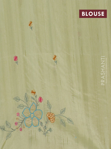 Semi raw silk saree pista green with embroidery buttas and floral embroidery border