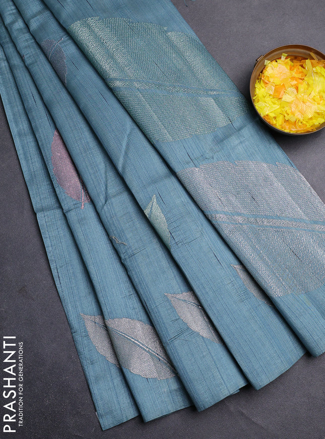 Semi raw silk saree pastel blue shade with leaf embroidery buttas in borderless style