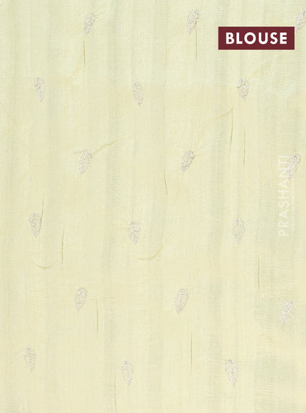 Semi raw silk saree pista green with leaf embroidery buttas in borderless style