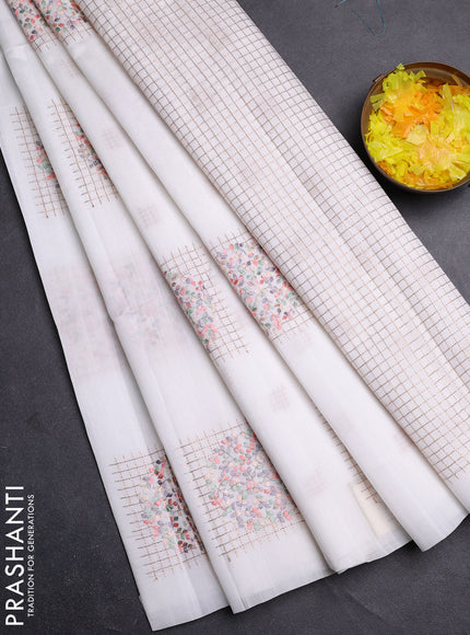 Semi raw silk saree off white with embroidery buttas in borderless style