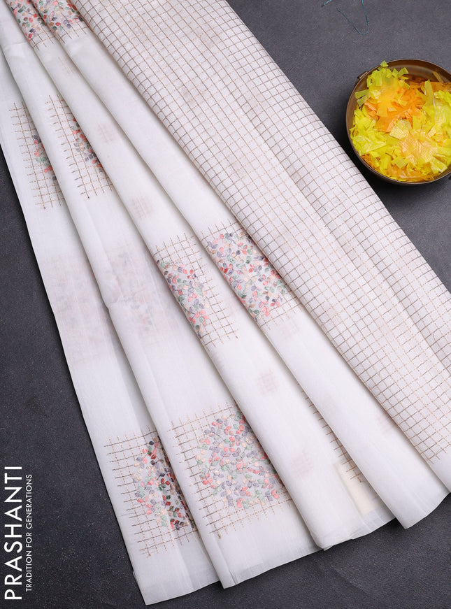 Semi raw silk saree off white with embroidery buttas in borderless style