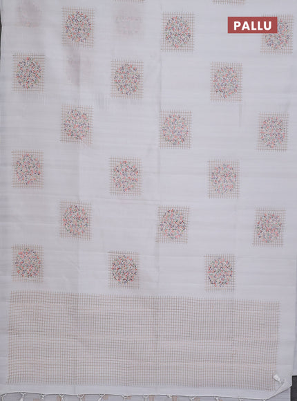 Semi raw silk saree off white with embroidery buttas in borderless style