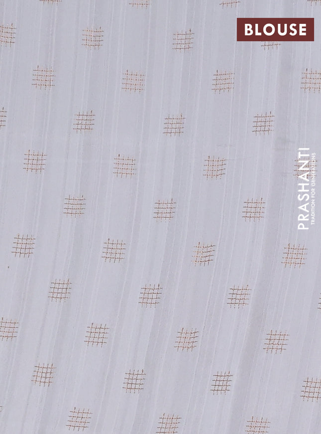 Semi raw silk saree off white with embroidery buttas in borderless style